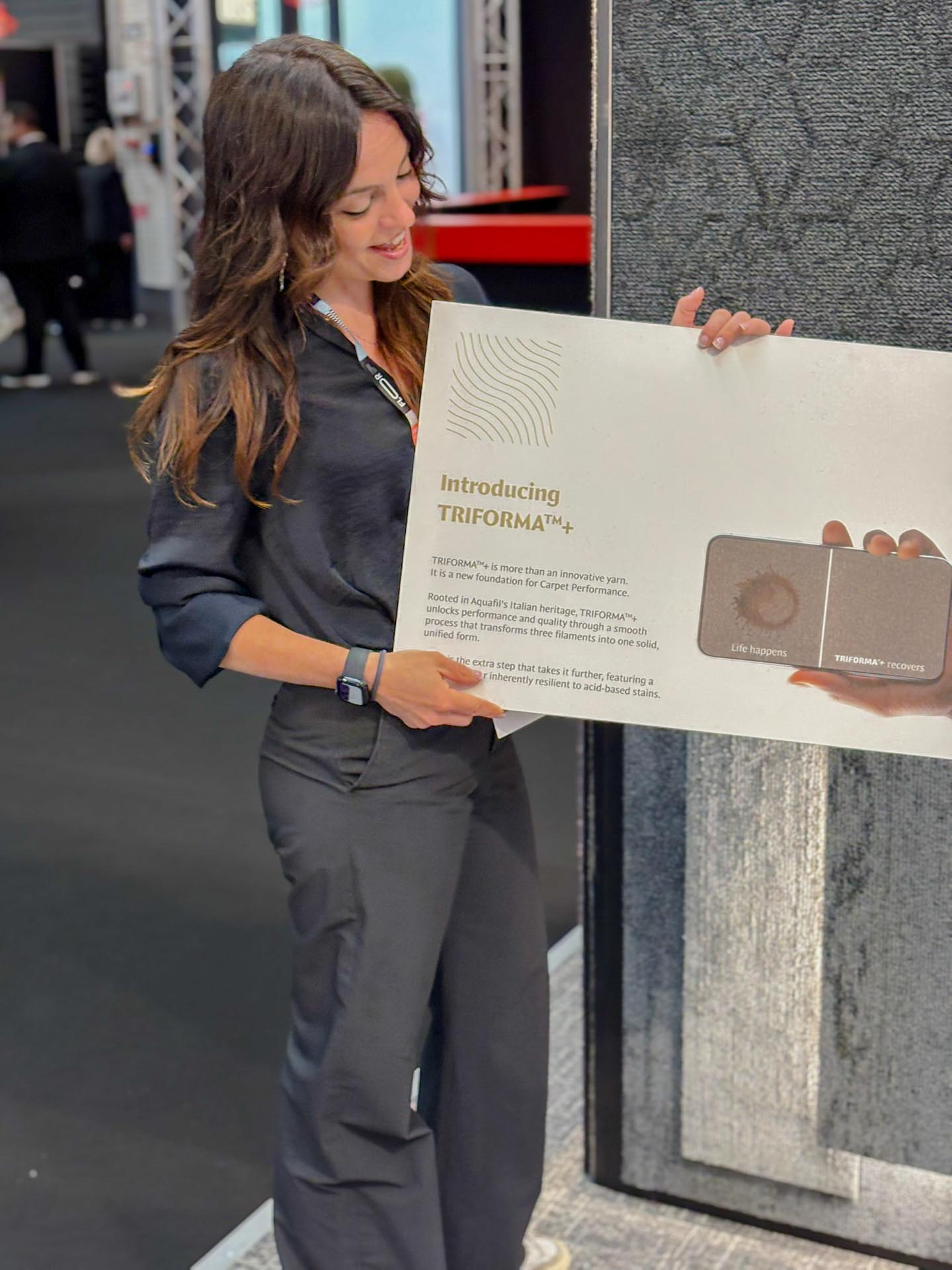 Samples with TRIFORMA+ yarn on display at the Tapibel stand during Flanders Flooring Days